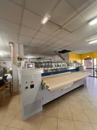 NOUVELLE INSTALLATION D’UNE LIGNE DE REPASSAGE AVEC CALANDRE D1200X3300G ET PLIEUSE FOLTEX LP330