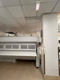 NOUVELLE INSTALLATION D’UNE LIGNE DE REPASSAGE AVEC CALANDRE D1200X3300G ET PLIEUSE FOLTEX LP330